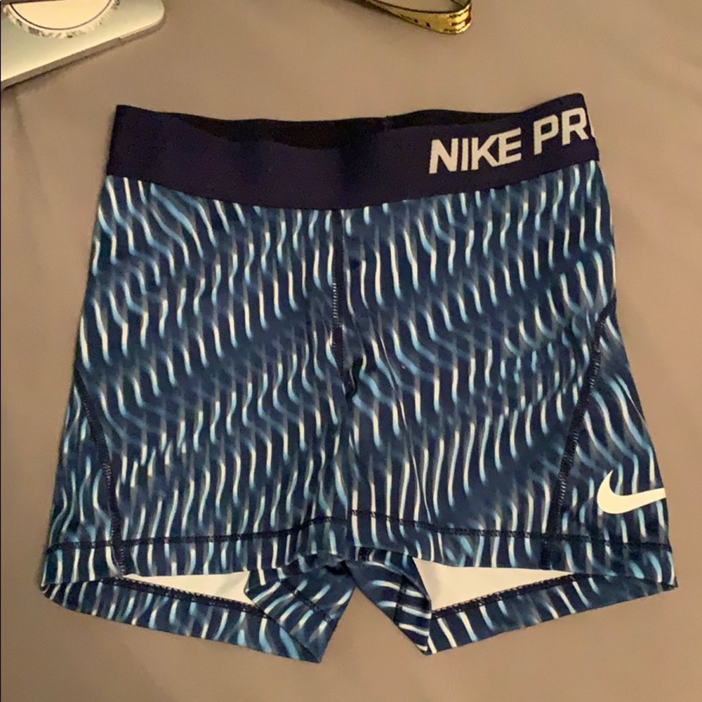 Blue patterned nike pro shorts
